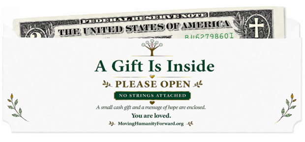 Folded envelope with gift message and cash inside